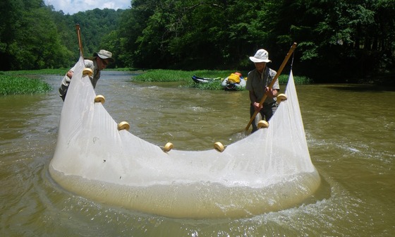 Deb Weiler and Brett Albanese doing field work.