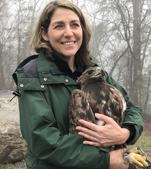 Ruth Stokes with eagle (USFS)