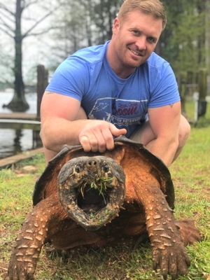 Angler with alligator snapping turtle