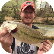 ManHoldingSpottedBass