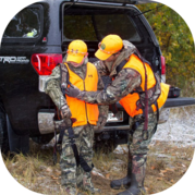 Adult mentoring youth hunter 