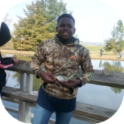 Kid holding fish he caught