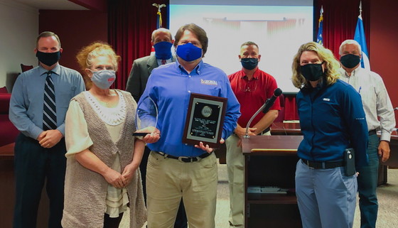 Parks Volunteer of the Year J. Mincy Moffett Jr., center, with Oconee County officials (Oconee County)