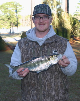 Christian Blake Jones with state-record hickory shad (DNR)