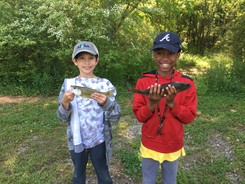 two kids fishing