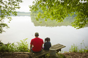 Dad and girl fishing