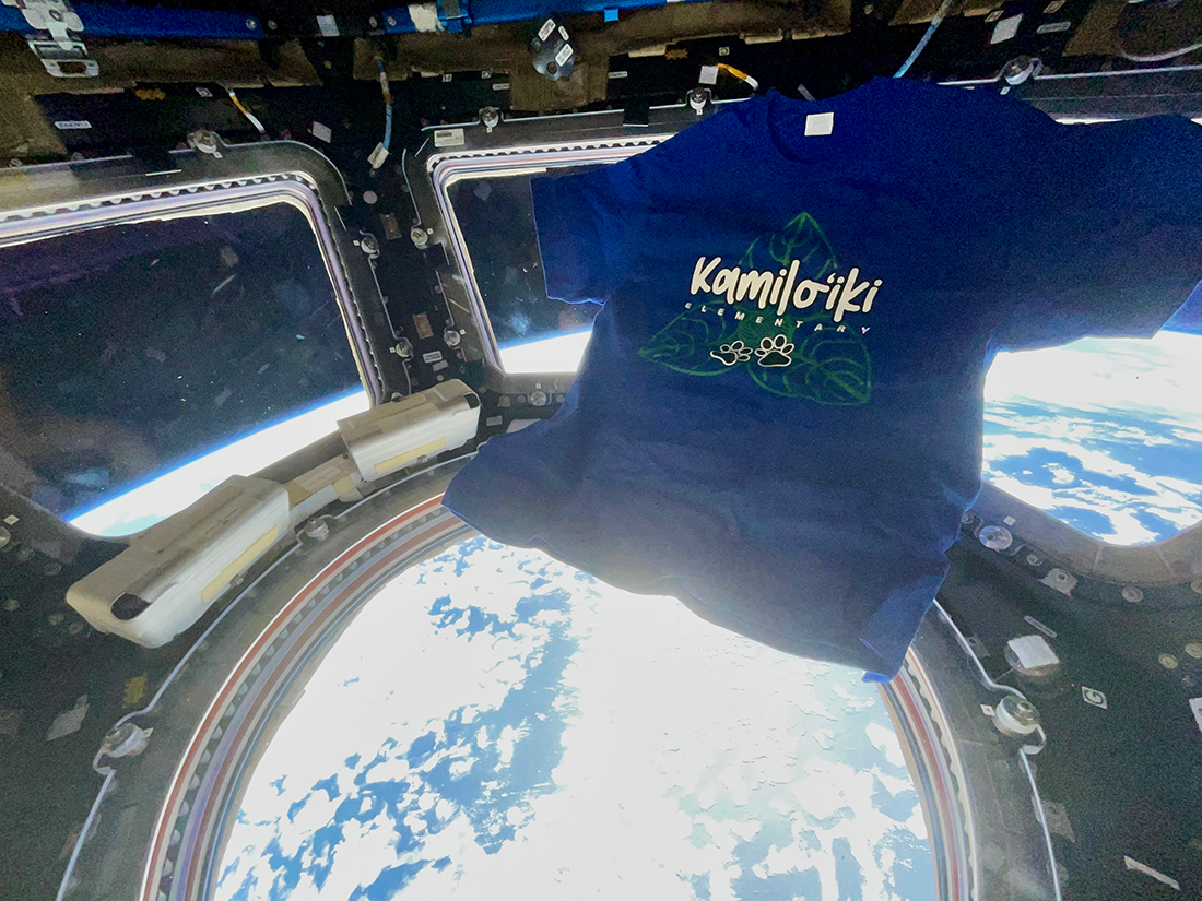 Kamiloiki Elementary School shirt aboard the International Space Station
