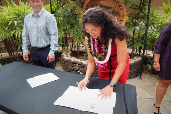 Michelle signing oath