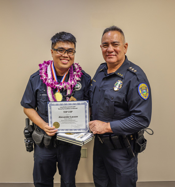 Officer Alexander Lacson and Deputy Chief Mark Ozaki.