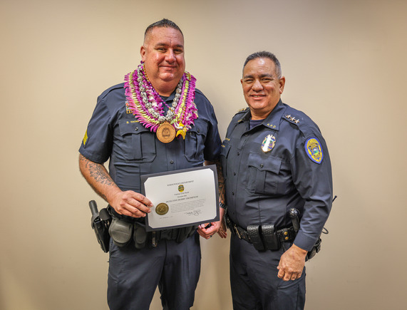 Detective Bobby Thompson and Deputy Chief Mark Ozaki at the Police Commission meeting on Friday, Dec. 20, 2024. 