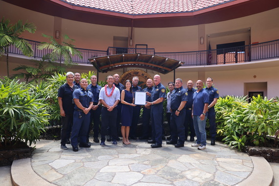 Mayor Derek S.K. Kawakami presents Wildfire Awareness Month Proclamation.