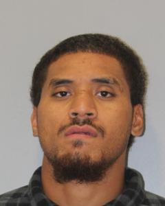 Tuulangavalu is described as 6 feet 3 inches tall, weighing approximately 220 pounds, with brown eyes and black hair.