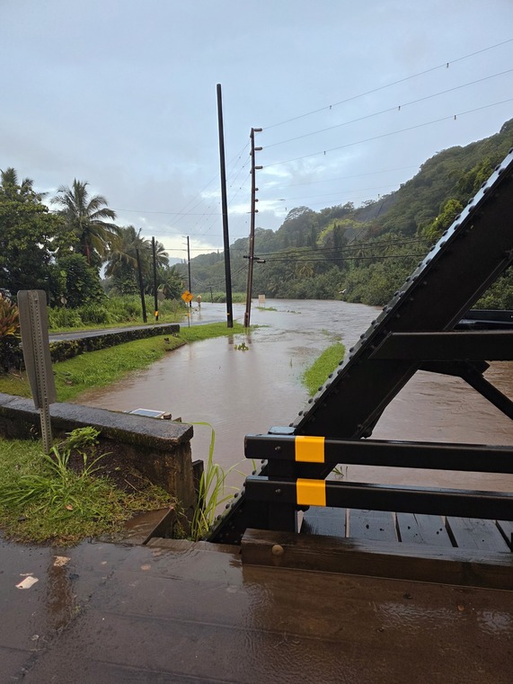 Kuhio Highway flooded near the Hanalei River.