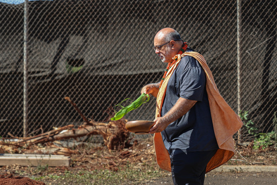 Kahu Sean Chun conducts a traditional Hawaiian blessing to prepare the project site. 
