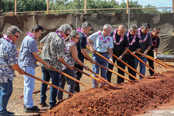 Community leaders and project partners join together to break ground.