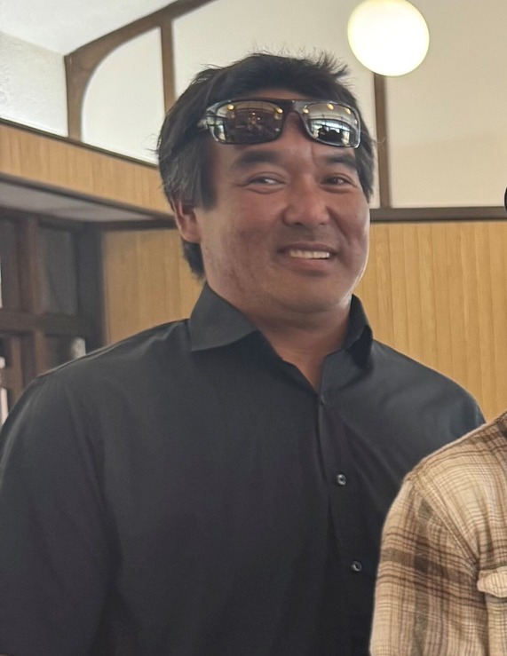 Bryson Higashi is five feet ten inches tall, weighs approximately 200 pounds, has brown eyes and black hair.