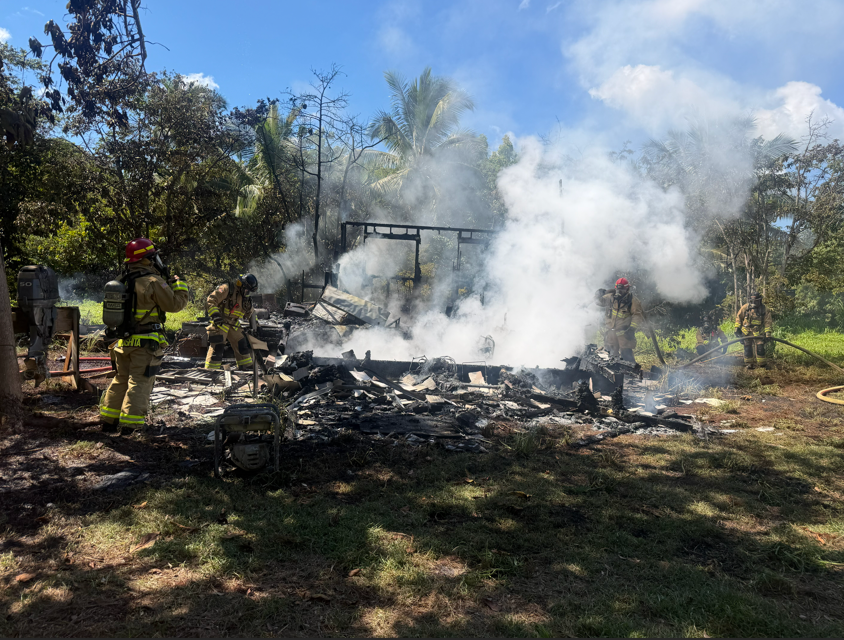 Firefighters arrive on scene and continue to extinguish the structure. ###