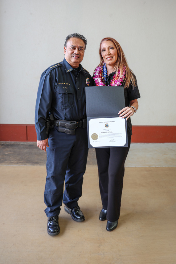 Emergency Services Dispatcher Stephanie Neher and Chief Rudy Tai.