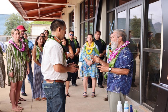 Mayor Derek S.K. Kawakami, left, and Kahu Calvin Ho take part in the blessing of the Piʻikoi Youth Center.