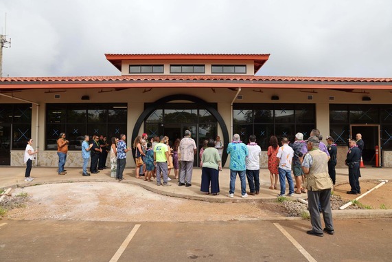 Guests gather outside the new Piʻikoi Youth Center during the blessing ceremony.
