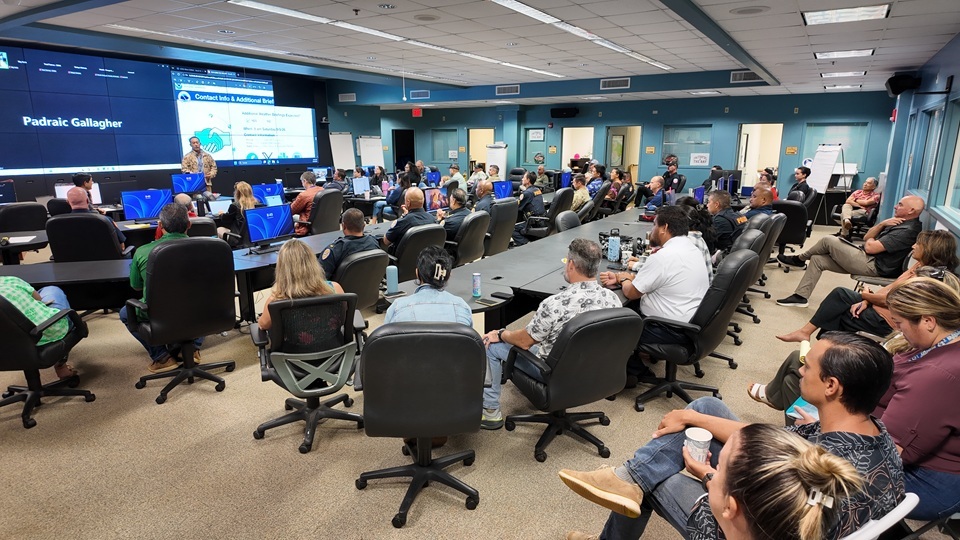 KEMA officials and partners gather at the EOC to prepare for potential impacts from severe weather from Hurricane Lowell.