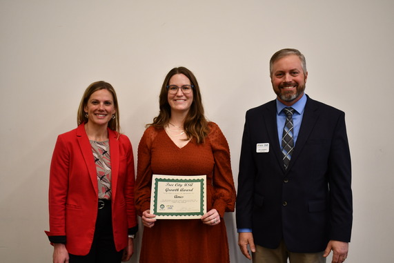 City Forester accepting award