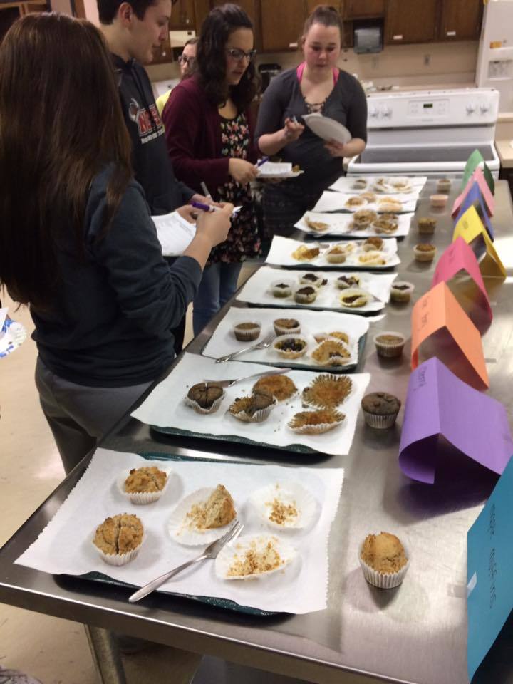 Students sampling muffins picture