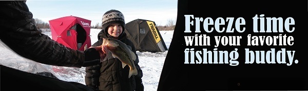 A young boy ice fishing,