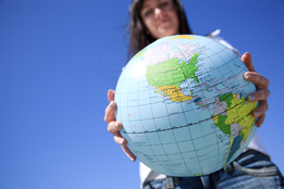 Girl holding globe