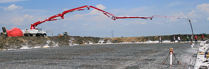 Pouring concrete floor for confinement manure storage.