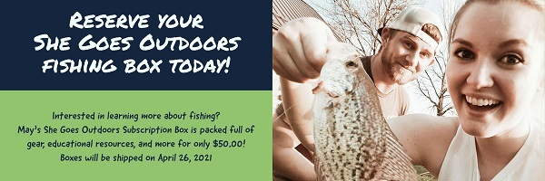 A couple with a crappie they caught.