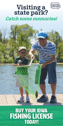 family fishing and buying licenses at state parks