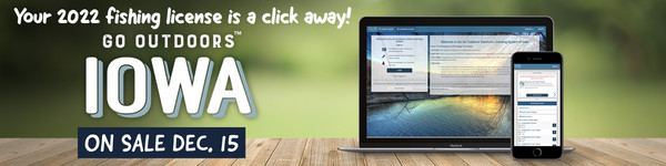 A laptop and mobile phone screen displaying the Go Outdoors Iowa licensing app.