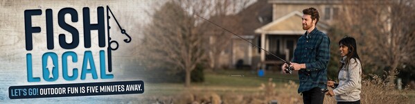 A couple fishing at a community fishing pond