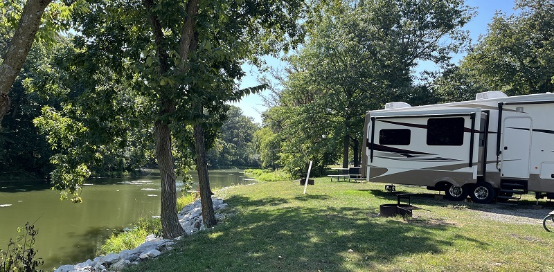 camper in state park campground