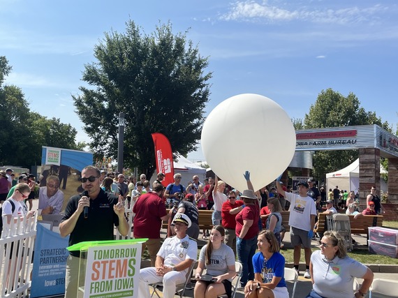 Dan Harbeke of Google announces a $100,000 donation from Google to Iowa STEM during STEM Day at the Fair.