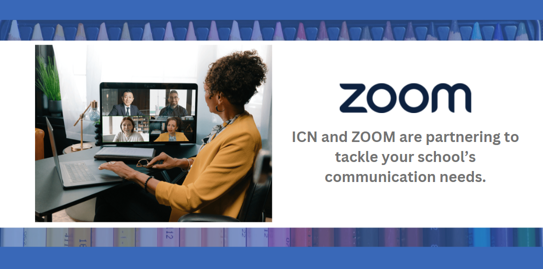 woman using two laptops to attend a zoom meeting