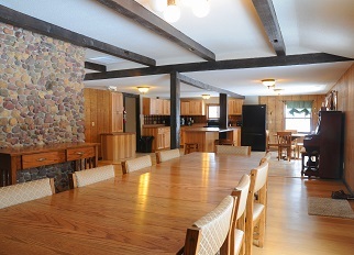 Springbrook State Park cabin interior featuring dining and kitchen area
