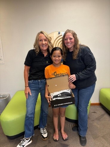 Iowa Total Care members at Shoes for Shots event