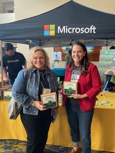 Council co-chairs pose with FarmBeats kits