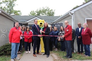 ITC Staff at a ribbon cutting with Central Iowa Shelter and Services 