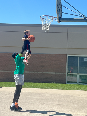Student mentors engaged younger students in games during recess.