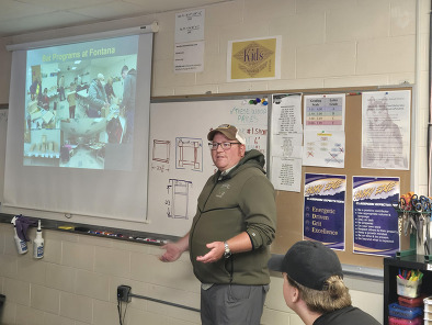 Michael Maas,  Buchanan County Conservation Board naturalist, presenting to the class on bats and their habitats.