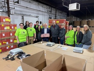 Iowa Total Care volunteers at a food bank