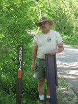 Mike Beeler with TEAS sign