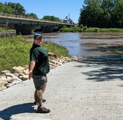 Erica by Raccoon River with muddy legs