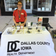 Community Health Administrator provides health education materials at a local farmer's market