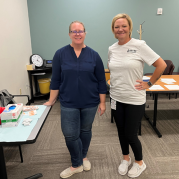 Immunization team works a workplace flu clinic
