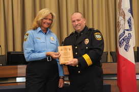 Kelly Jehel with the Police Chief. 