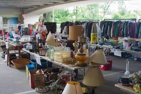 Photo of woman shopping in rummage sale